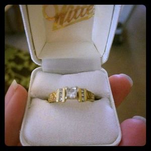 Yellow gold and diamond engagement ring